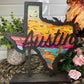 Texas Stand with Austin Skyline/Bats